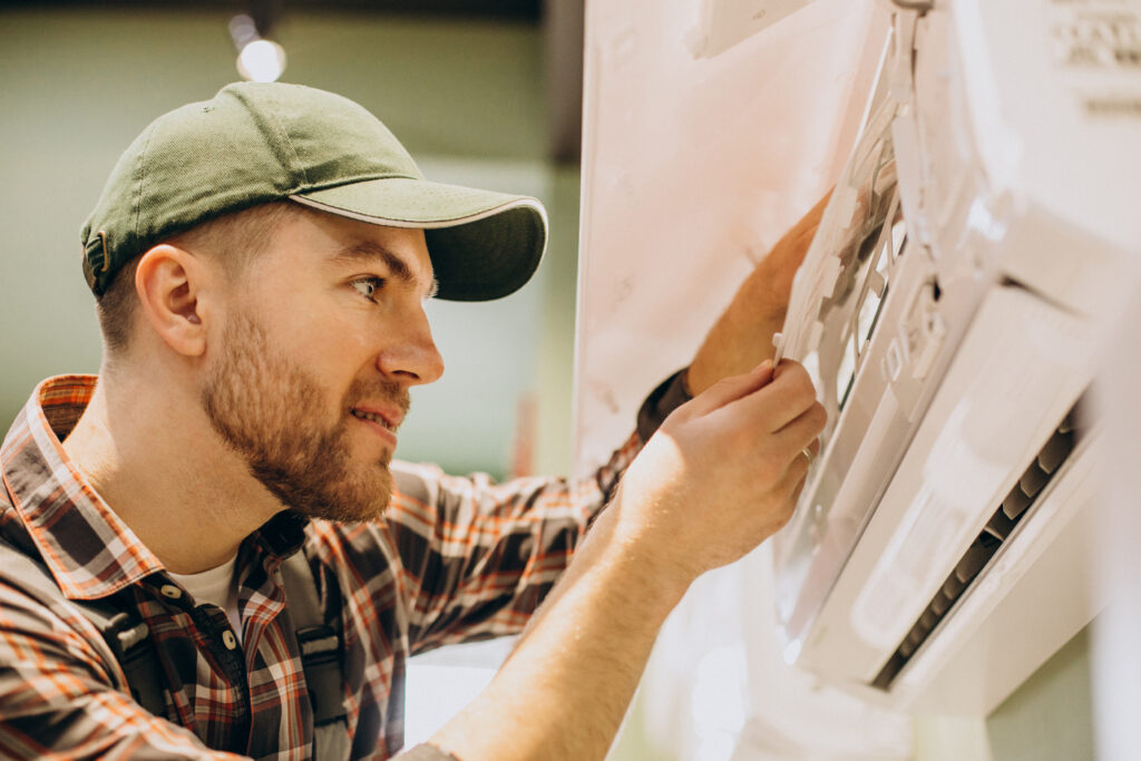 Air conditioner repair technician servicing split AC in Pune